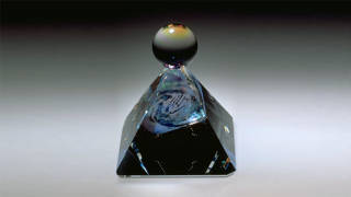 Hand Of Fire colored glass sculpture by Michael Bokrosh